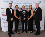 From Randox Jason Webster, Host Sarah Travers, Causeway Chamber President James Kilgore, Karen Yates, CEO Causeway Chamber and Cllr Steven Callaghan, Mayor of Causeway Coast & Glens Borough Council at the Causeway Chamber of Commerce Awards 2023 in partnership with Randox Health held at the Lodge Hotel.      08 Chamber Awards Corporate 2023