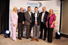 James Kilgore, President Causeway Chamber with special guest Havier Beltran, Honda Team Manager and evening sponsor Mark Hutchinson of Hutchinson with Chamber sponsors Arlene McConaghie Riada Resourcing (left), Ian Donaghey IDS Chartered Accountants LLP (2nd from right) and Angela Stewart Abbey Autoline(right)  at the Lodge Hotel for the Presidents Dinner held in partnership with Briggs Equipment NW200 and sponsored by Hutchinson.      16 Presidents Dinner 2024